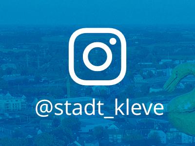 Das Instagram-Logo vor einer Drohnenaufnahme der Stadt Kleve